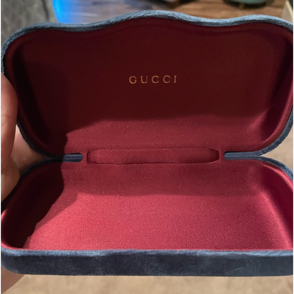 Gucci sunglasses case . Navy velvet with red interior. Like new condition